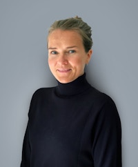 Female employee with black sweater